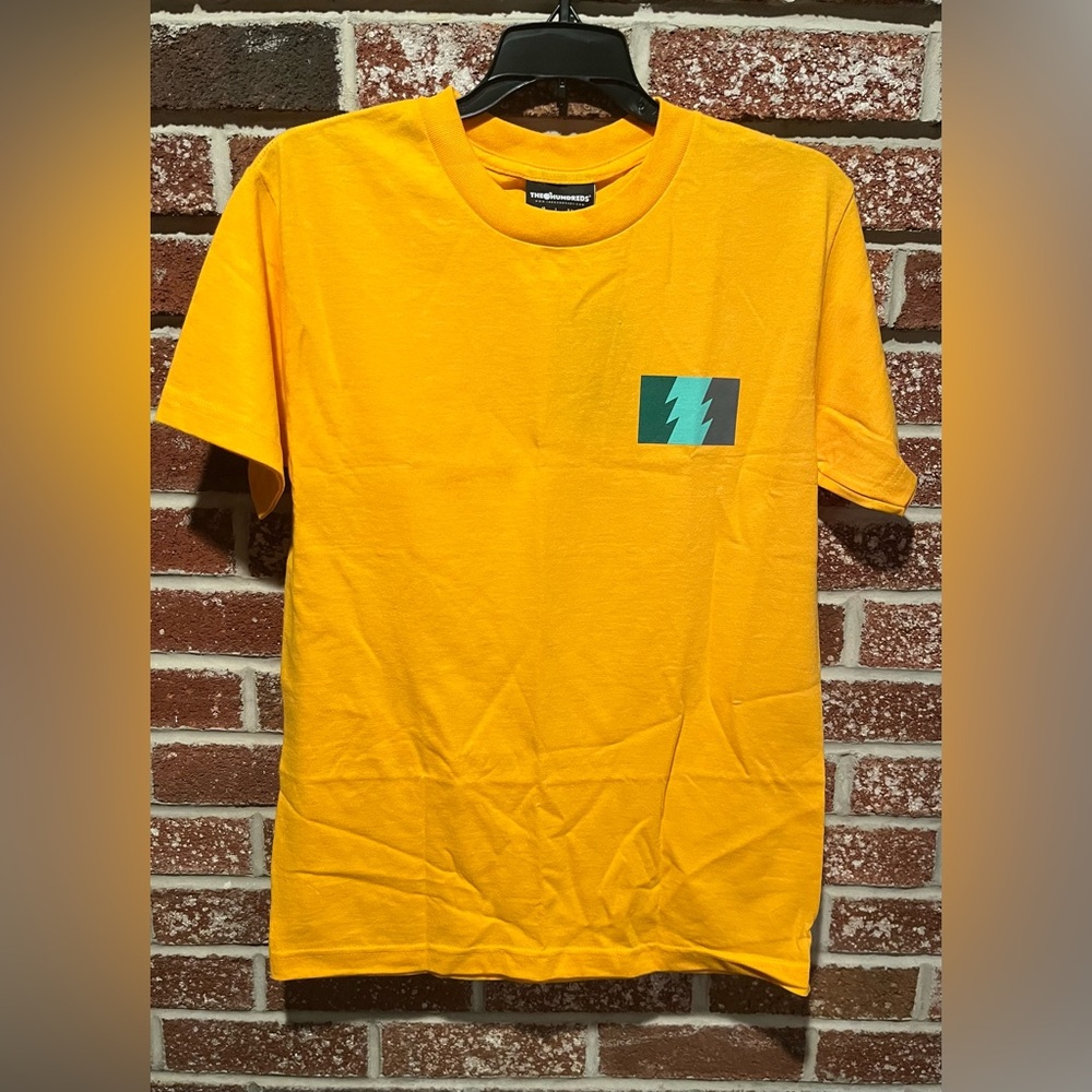 The Hundreds Gold Tee with Blue Thunderbolt